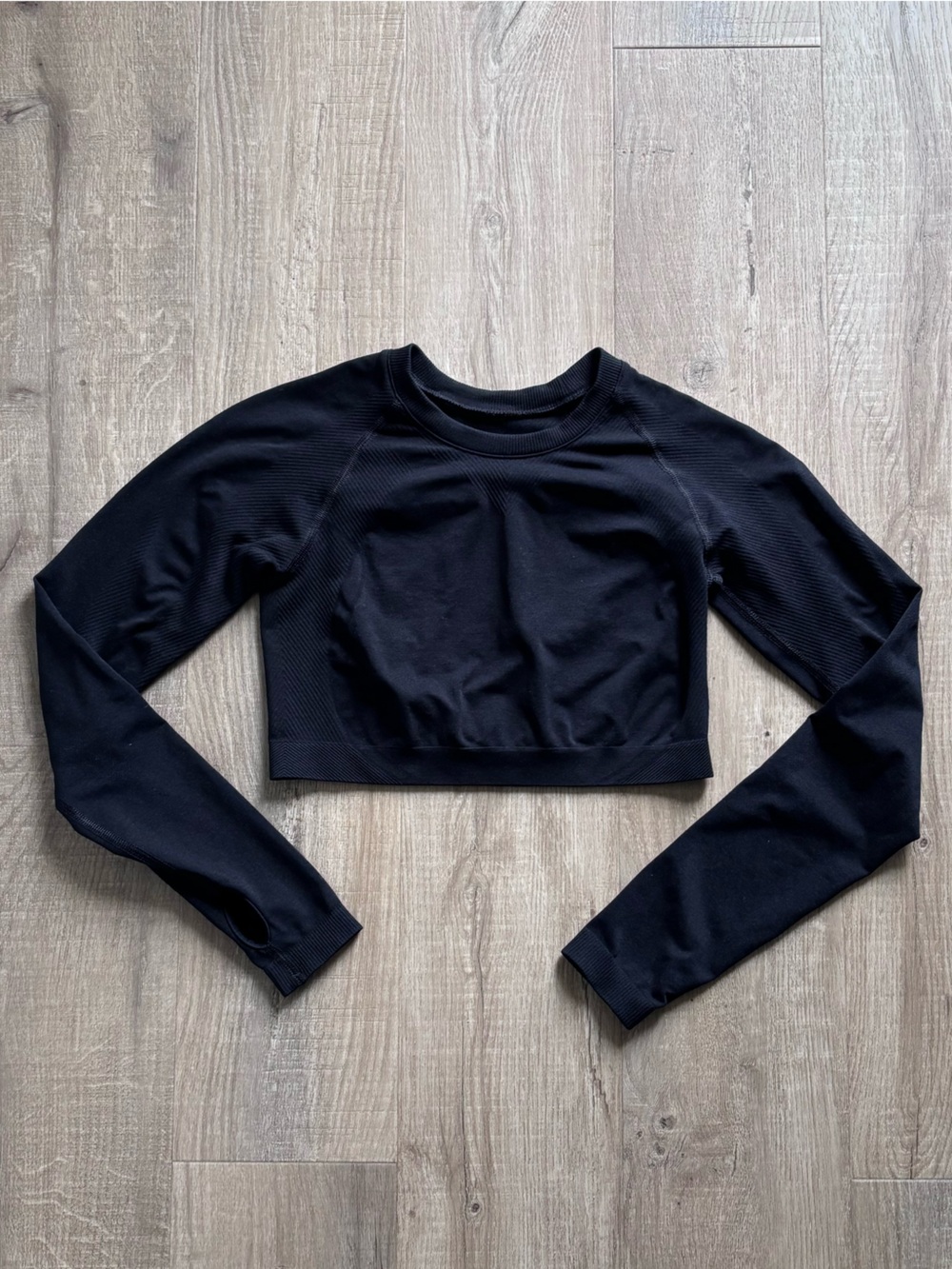 Alphalete Stratus Crop Long Sleeve Top in Black